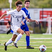 Victor Naci ’25 playing soccer