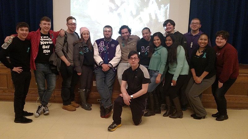 Jonathan Kalin with student representatives from SJC Brooklyn