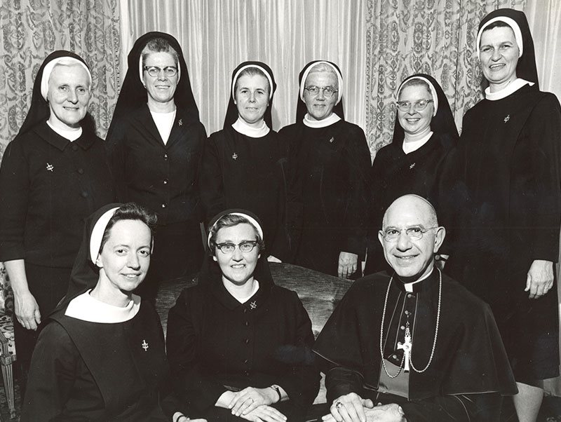 S. John Raymond With Clergy